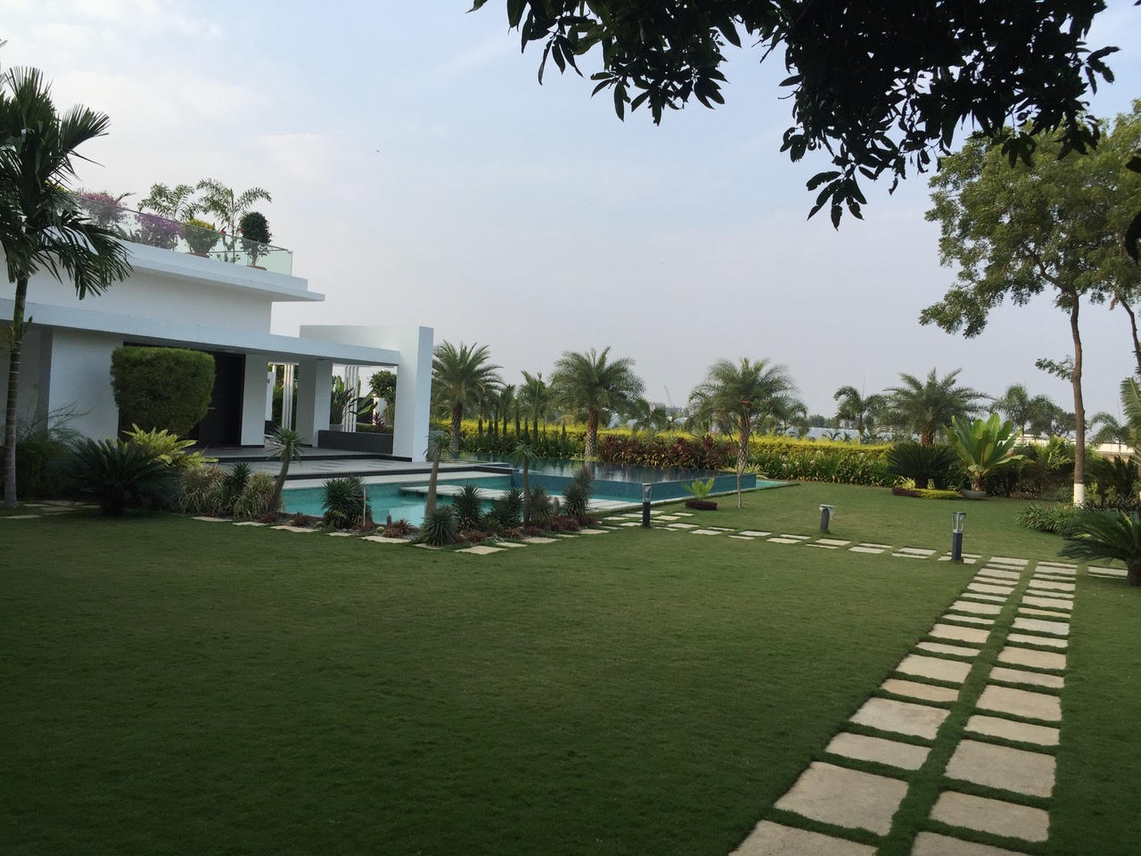 naveen farmhouse pathway Envision Landscapes architects Ar Vinod savalam Landscape architect